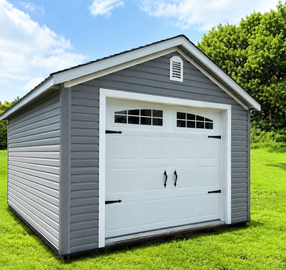 Gray vinyl garage with white overhead door